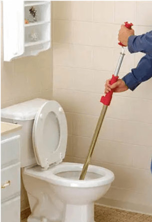 Unclogging Toilet with Plunger